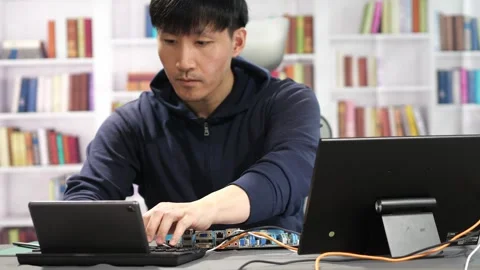 Software Engineer working on an Artificial Intelligence program Stock Footage 295395042