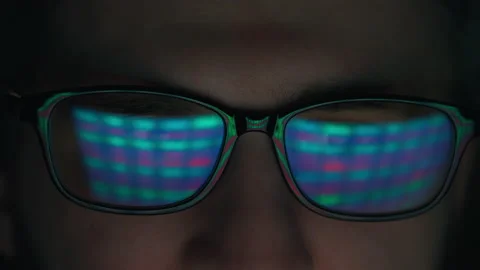 Software engineer working on computer. Line of hack code run in reflection Stock Footage 222628208