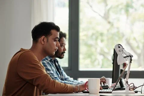Software Engineer Working on Laptop Stock Photos