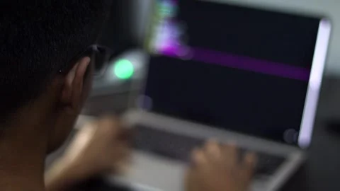 Software Engineer Working on Laptop with Programming Code in Modern Office Vidéo 340450407