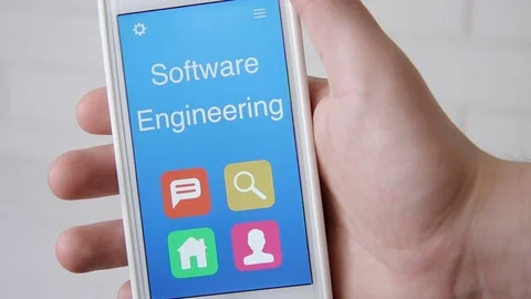 Software engineering concept application on the smartphone. Man uses mobile app. Stock Footage 77414133