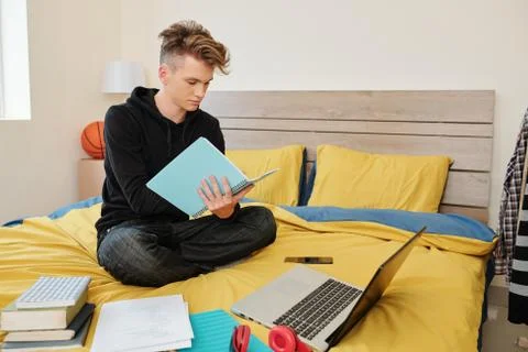 Software engineering student at home Stock Photos
