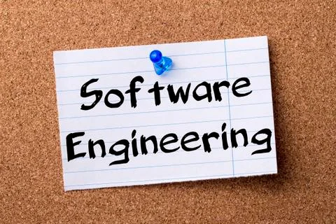 Software Engineering - teared note paper pinned on bulletin board Stock Photos