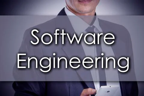 Software Engineering - Young businessman with text - business concept Stock Photos