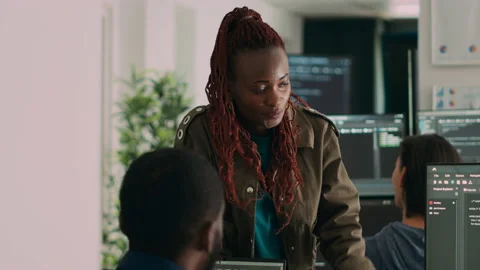 Software engineers analyzing source code and database Stock Footage 227612347