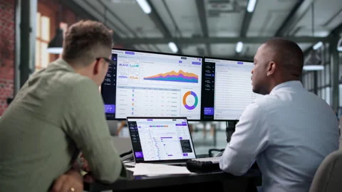 Software Engineers Collaborate On AI Platform Workflow Monitoring Stock Footage 345311530