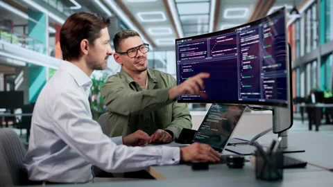 Software Engineers Collaborate Carefully On Coding Secure Platforms Stock Footage 347293465