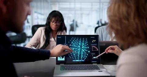 Software Engineers Meet To Discuss AI Algorithm Research In Office. Stock Photos