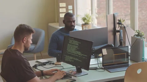 Software Engineers Program Coding in Office Stock Footage 224050387