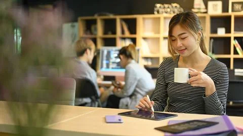 Software engineers team leader using digital tablet and young IT development Stock Photos