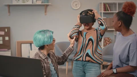 Software Engineers Testing VR Goggles in Office Stock Footage 241272981