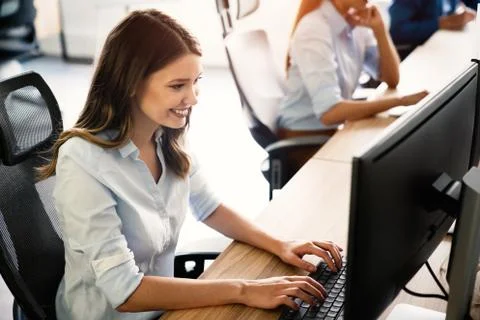 Software engineers working on project and programming in company Foto stock