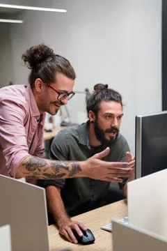 Software engineers working on project and programming in company Stock-Fotos