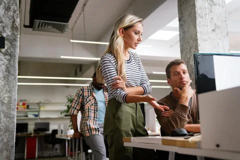 Software engineers working on project and programming in company. Startup Photos