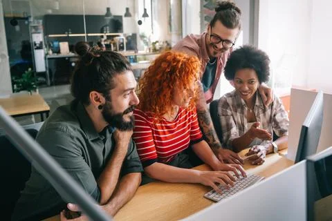 Software engineers working on project and programming in company. Startup Photos