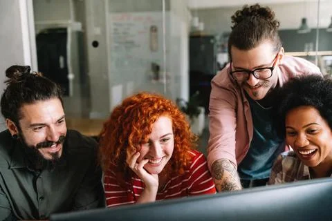 Software engineers working on project and programming in company. Startup Stock-Fotos