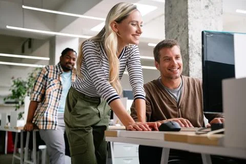 Software engineers working on project and programming in company. Startup Stock Photos