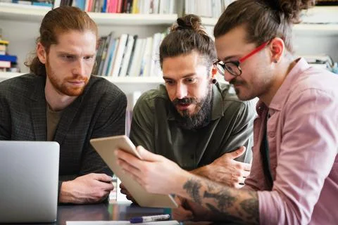 Software engineers working on project and programming in company. Startup Photos