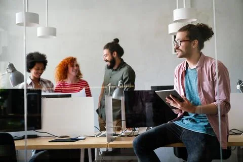 Software engineers working on project and programming in company. Startup 库存照片