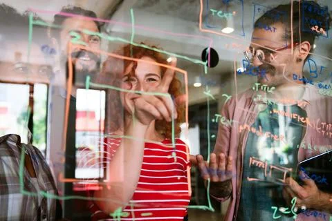 Software engineers working together on project at tech startup. Business de.. Foto stock