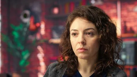 Software expert at workstation programming on pc and writing lines of code Stock Photos