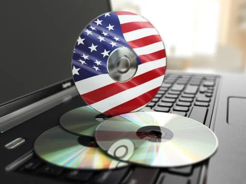 Software made in usa cd on laptop keyboard. compact disks. Stock Illustration