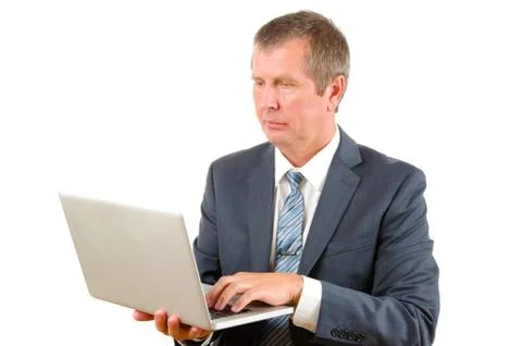 Software manager in suite with laptop in hands on white background Stock Photos