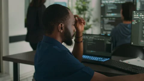 Software programer brainstorming ideas to write code and create security program Stock Footage 220894818