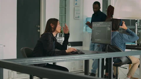 Software programer feeling stressed about writing code in front of computer Stock Footage 231449527