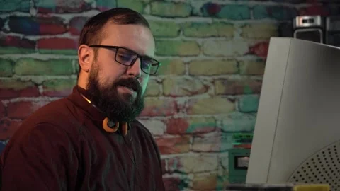 Software Programmer From 1990's Smoking Cigarette in Front of Desktop Computer Stock Footage 305836630