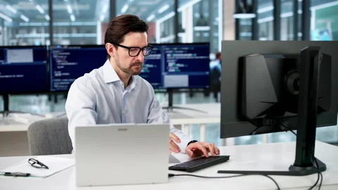 Software Programmer Focused On Coding Stock-Footage 334930368