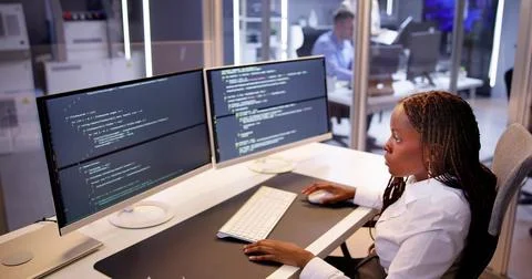 Software Programmer Or Coder Woman Stock-Fotos