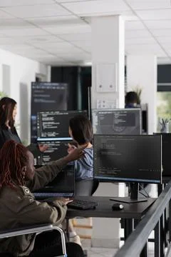 Software programmer with physical disability working on server coding Stock-Fotos