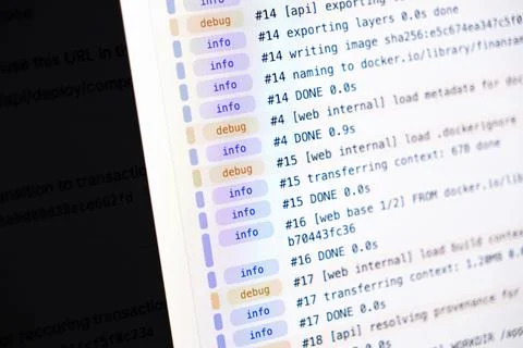 Software programming code lines scrolling on a computer monitor, displaying Stock Photos
