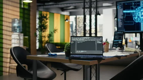 Software running on laptop in empty office to accelerate calculations Stock Footage 323143532