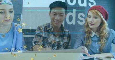 Software team examining code on laptop at office meeting, with notebooks, pens, Stockfoto's