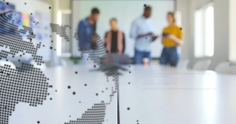 Software team inputting smartphone command and activating rotating globe overlay Stock Footage 314653651