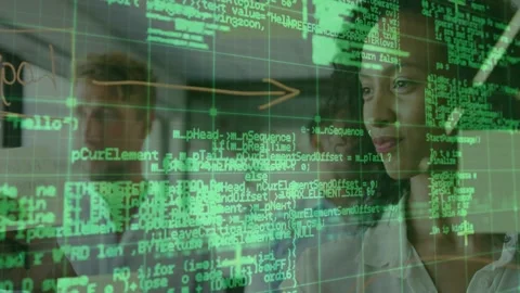 Software team of three studying glass panel, following animated code updates and Stock Footage 330330803