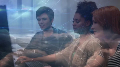 Software team typing at monitors for code review, displaying translucent network Stock Footage 316185724