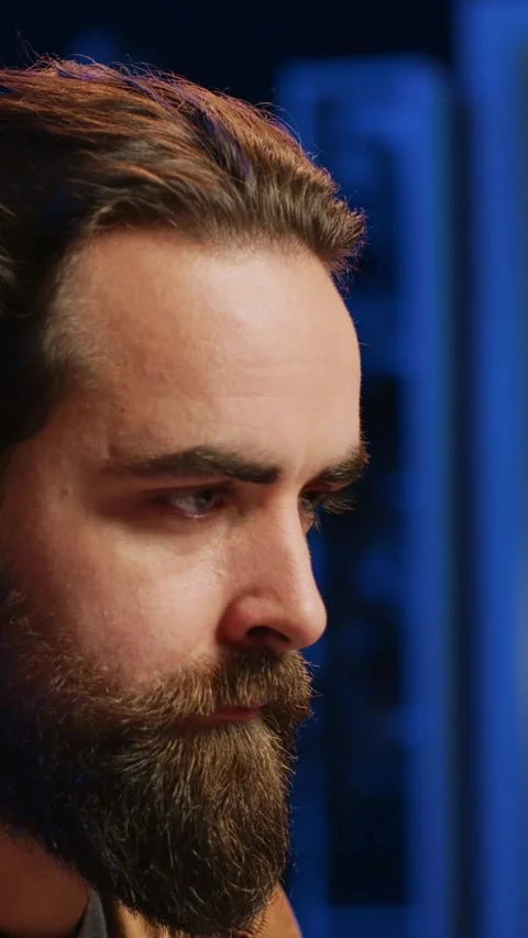 Software technician in apartment office deeply immersed in coding, close up Stock Footage 264511397