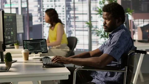 Software technician with disability in inclusive workplace working Stock Footage 318160924