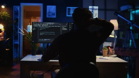 Software technician frustrated while updating complex binary code Stock Footage 265507972