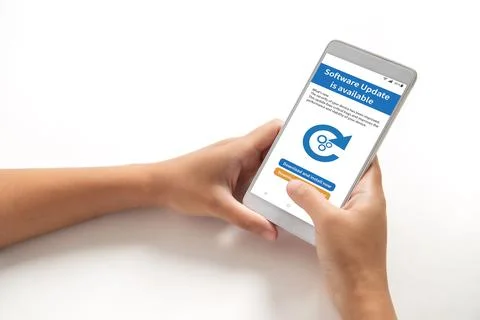 Software update in available, Hand holding smart phone with software update o Foto stock