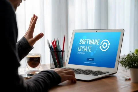 Software update on computer for modish version of device software Foto stock