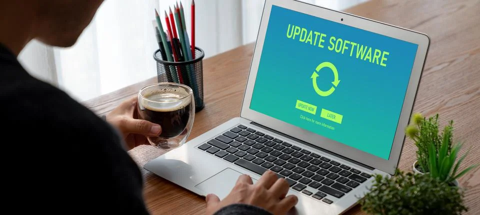 Software update on computer for modish version of device software Foto stock