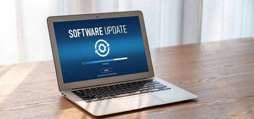 Software update on computer for modish version of device software Stock Photos