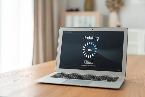 Software update on computer for modish version of device software 스톡 사진