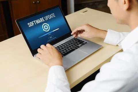 Software update on computer for modish version of device software 스톡 사진