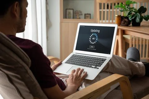 Software update on computer for modish version of device software Foto stock