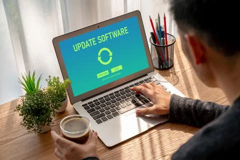 Software update on computer for modish version of device software Stock Photos
